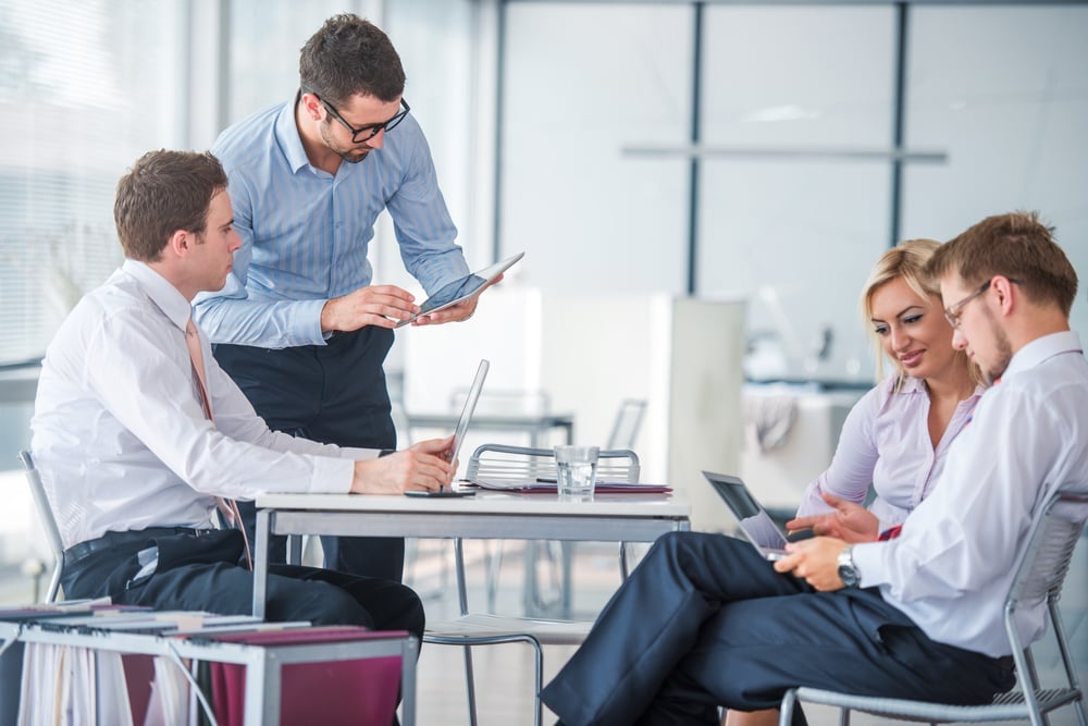 Managers at meeting in modern office